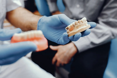 Dental Bridge vs Implant for Front Tooth: Which One Should I Get?